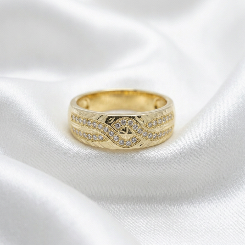 Gold CZ wedding band on white satin