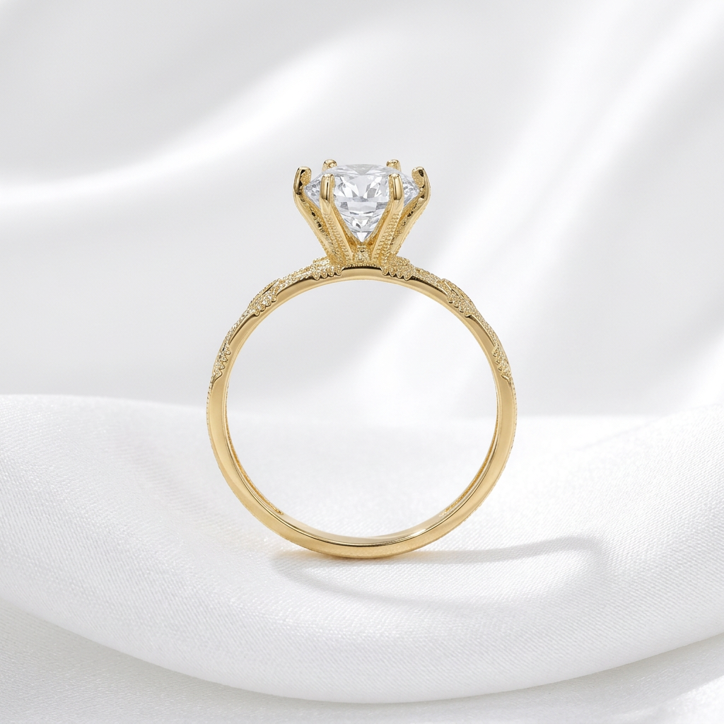 Side profile of the yellow gold CZ ring from the 10kt Gold His and Hers Wedding Trio Set on white satin
