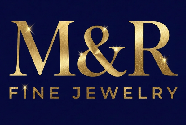 M&R Fine Jewelry logo with sparkling-gold lettering